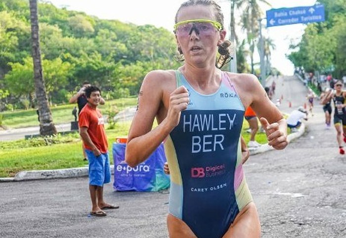 Erica Hawley racing in Bermuda kit